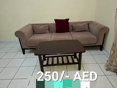 3-seater beige fabric sofa with coffee table - good condition, AED 250