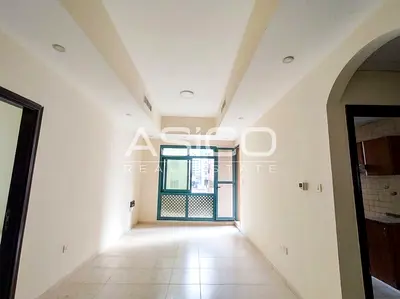 Spacious 1BR | Balcony | Al Muraqabat
