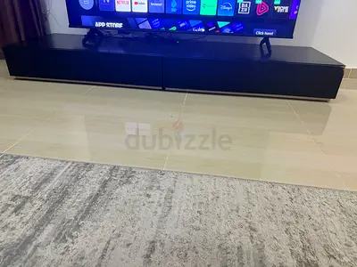 Low black TV entertainment unit - modern minimalist console