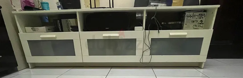 Brand new White low TV cabinet with three glass-front drawers - good condition