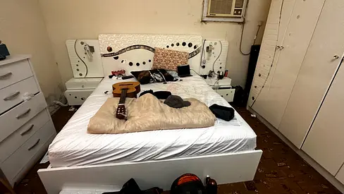 White double bed frame with headboard and matching bedside cabinets with mattress