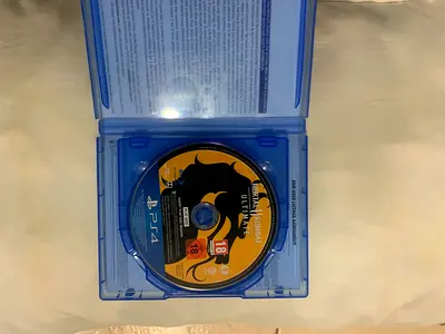 Mortal Kombat 11 Ultimate (PS5) disc in case