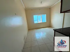 Spacious studio in Al Qulaya with sea view, central AC and gas, prime location close to services, an