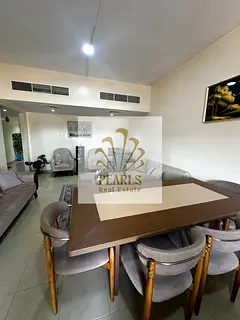 Furnished 2BR in Horizon Towers with open-view balcony, free parking, spacious layout, close to Ajma