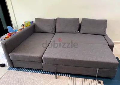 Modern Gray L-Shaped Sofa Bed with Pull-Out Section