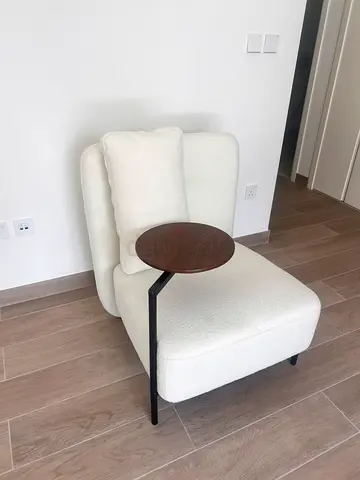 Brand New, Never Used Cream Corner Chair with mini moving table!