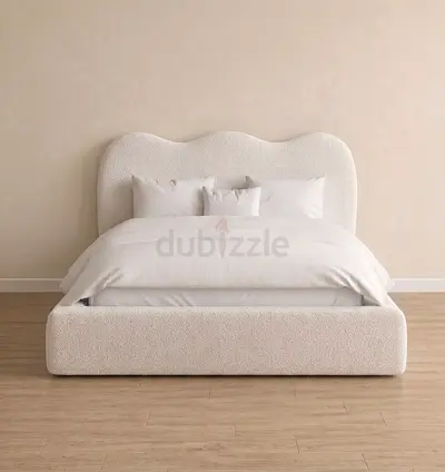 Cream boucle upholstered queen bed with curved headboard