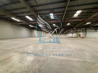 فرصة لوجستية وصناعية استثنائية | مستودع 125 ألف قدم مع منطقة تحميل وتفريغ ومكاتب على شارع الشيخ محمد بن زايد