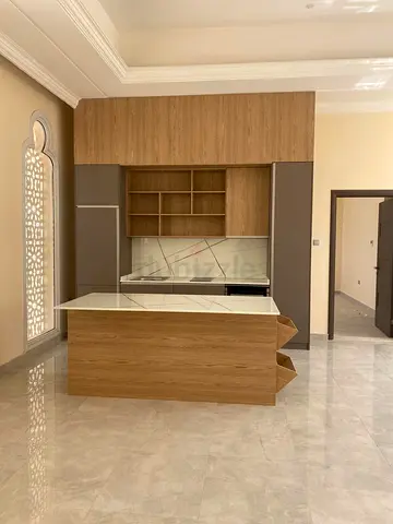 Modern kitchen with island -  wood finish, ,quartz countertop's built