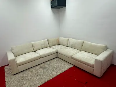 As like new condition pottery barn beige color sofa