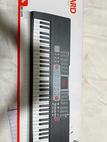 Portable 61-Key Electronic Keyboard (Brand: BOARD BX-1695) - Like New