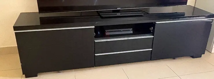 Black glossy TV cabinet / entertainment unit with drawers