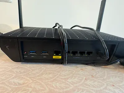 The Linksys MR9600 is a powerful AX6000 dual-band mesh Wi-Fi 6 router