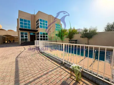 Luxury Villa for Annual Rent in Al Barashi Sharjah Private Pool Four Master Bedrooms Six Bathrooms Modern Finishing Spacious Yard Covered Parking Up t
