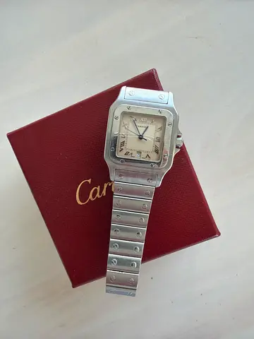Cartier Santos stainless steel men's watch. Genuine watch purchased in 1993 and service required.