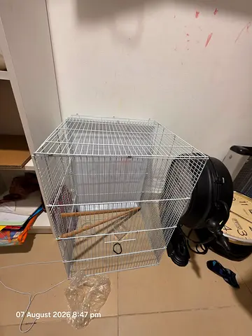 White metal bird cage with perches - good condition