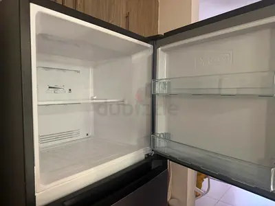 Compact fridge-freezer simi new used less than a year and still under warranty