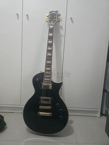 Black electric guitar brand brand Ltd