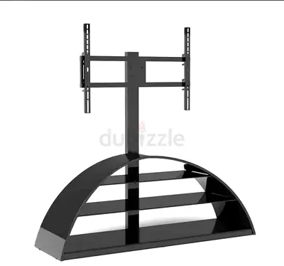 هذا الحامل التلفزيوني Sigma TV Stand SPA054 يتميز بتصميم نصف دائري عصري باللون الأسود.