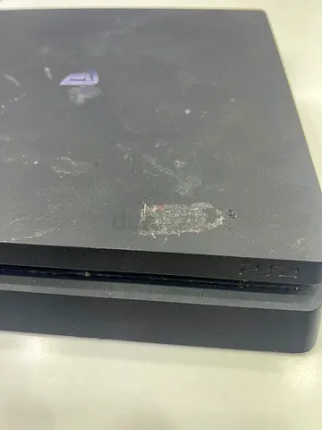 Used Sony PlayStation 4 Slim - 500GB (Good working condition, cosmetic marks)