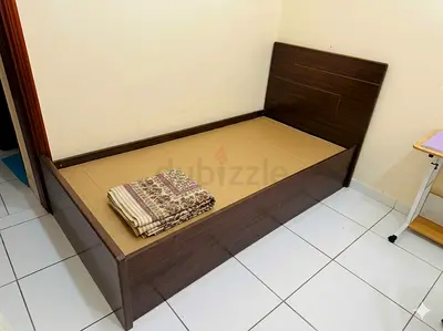 Single wooden bed frame with headboard - good condition