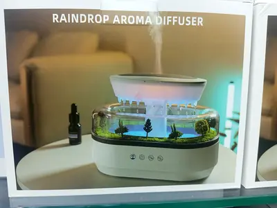 Raindrop Aroma Diffuser - Humidifier & LED Mood Light (Like New)