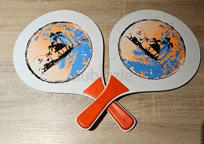 Pair of wooden beach paddle rackets - lightly used