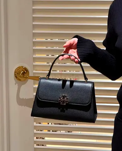 Black leather top-handle handbag - classic structured design