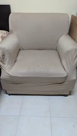 Single beige fabric sofa with removable cover - good condition