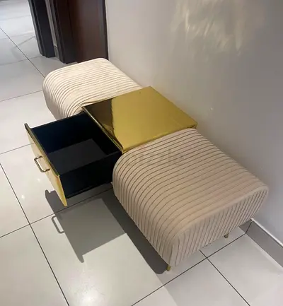 Compact velvet storage bench with gold metal accent - good condition