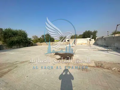 Yard for Rent in Al Sajaa 20,000 sq. ft. area with offices rooms kitchens and bathrooms 50KV power supply prime location suitable for industrial and c