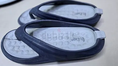Black casual slip-on sandals / flip flops, lightly used