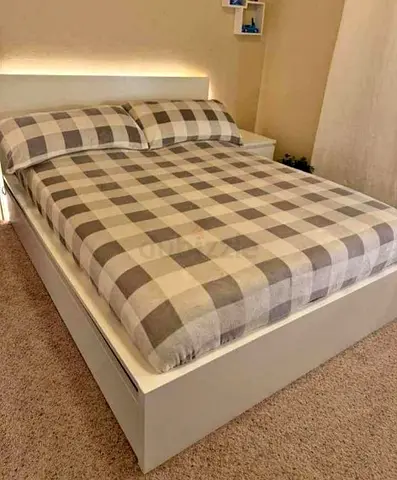 Ikea King Size Bed with mattress available in perfect condition