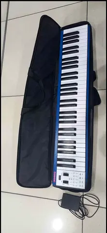 Portable 61-Key MIDI Keyboard with Case Padel and Power Adapter