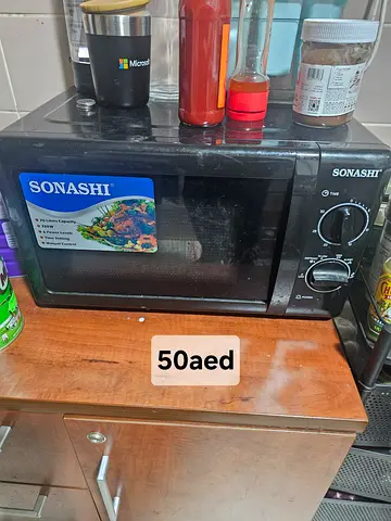 Sonashi Microwave Oven - Compact 20L, Good Working Condition - 50 AED