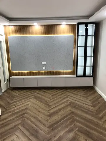 Custom Wall-Mounted Entertainment Unit with Display Cabinet and LED Backlighting