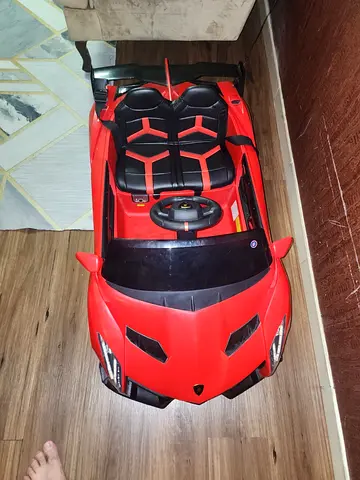 Red 2-Seater Electric Ride-On Car for Kids - Good Condition
