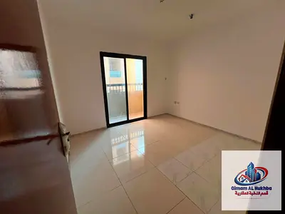 Al Majaz 1: 2BR with balcony for staff/bachelors sharing. Great view, free maintenance, all services nearby.