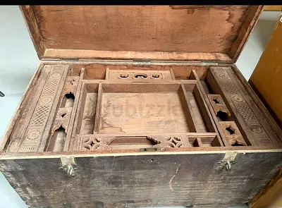 Antique wooden chest with carved internal compartments - vintage storage trunk