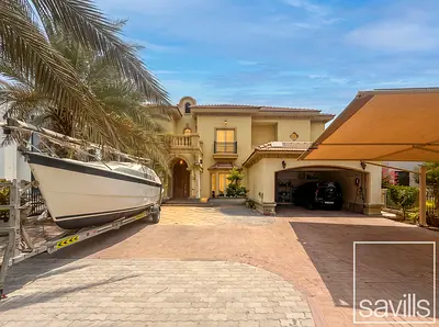 Situated On The Main Lake & Perfect For Renovation