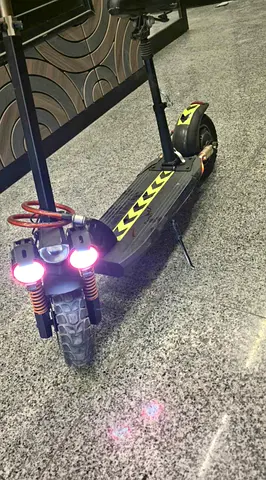 Electric Scooter - Dual Suspension with Seat, Good Condition