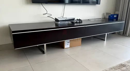 Low-profile modern TV console / entertainment unit - dark wood finish