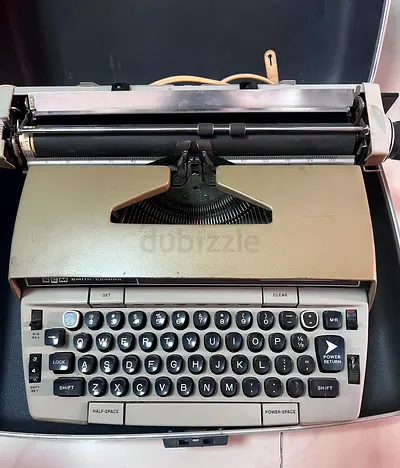 Vintage electric typewriter in case