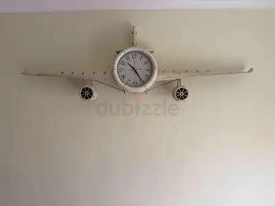 Vintage-style airplane wall clock decorative piece