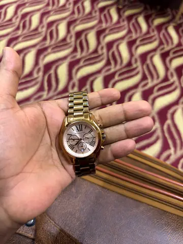 Micheal korz limited edition Pre-owned Michael Kors men's gold-tone bracelet watch strap