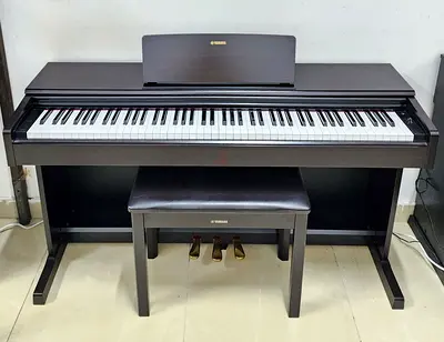 The Yamaha Arius YDP-105R is an 88-key digital console piano featuring GHS weighted action, AWM ster