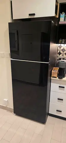 Samsung 550 litter refrigerator black colour latest model excellent condition for selling