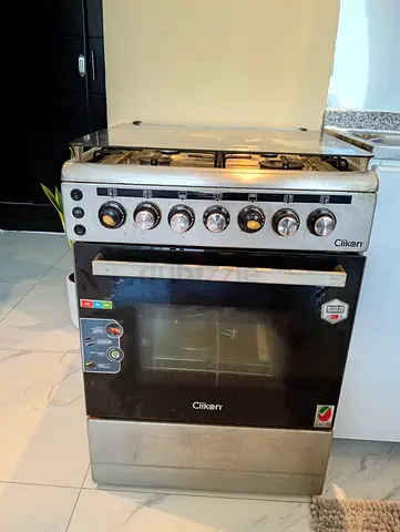 Clikon stainless steel gas cooker with oven - 4 burners, used