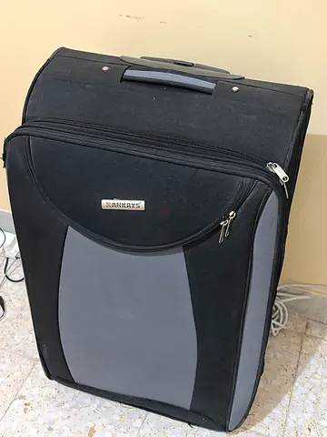 Black & grey soft-shell medium suitcase with wheels
