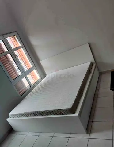 Ikea King Size Bed with mattress available in perfect condition